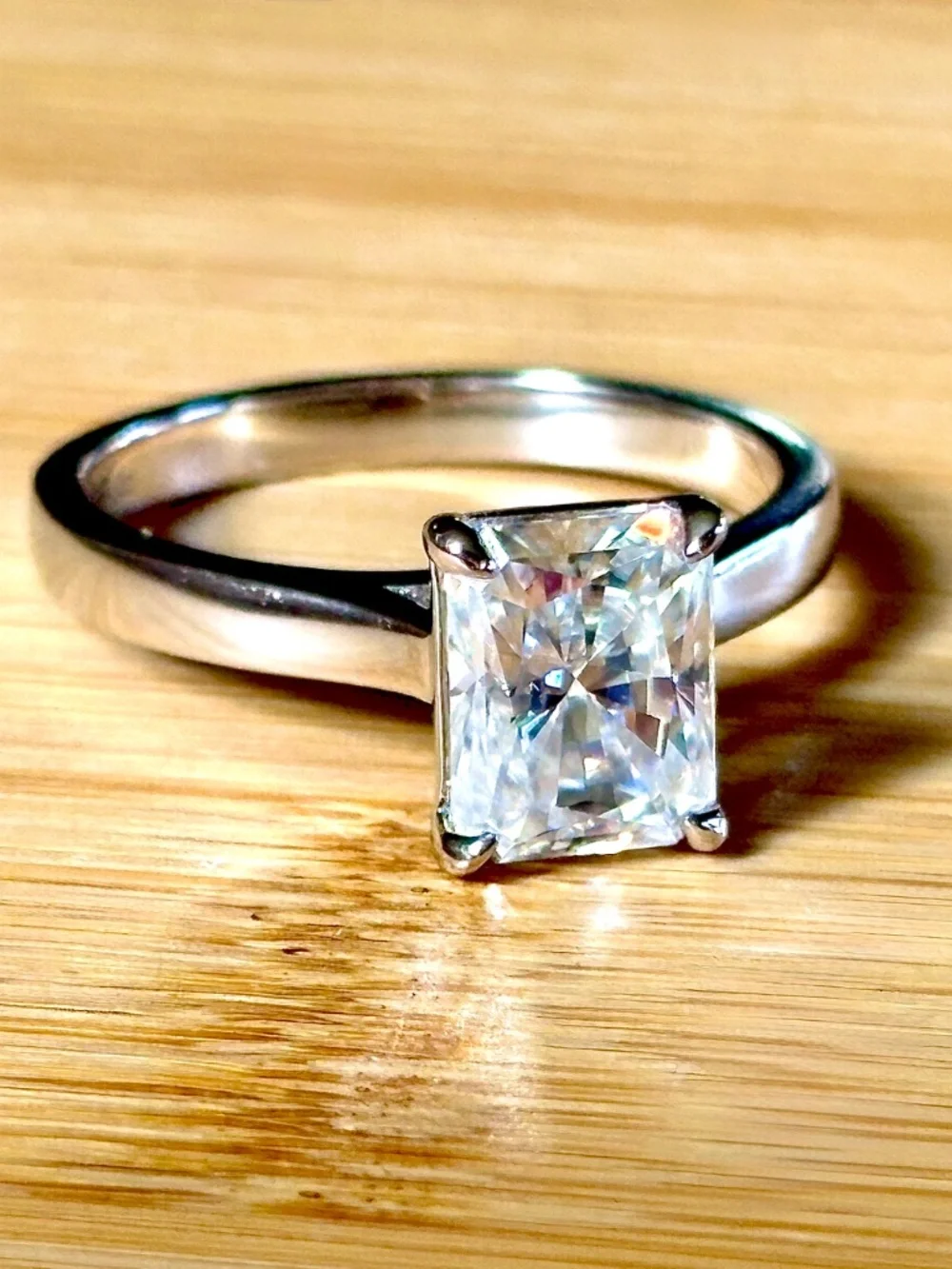 A certified 3ct radiant Moissanite solitaire in solid sterling silver and 18k!